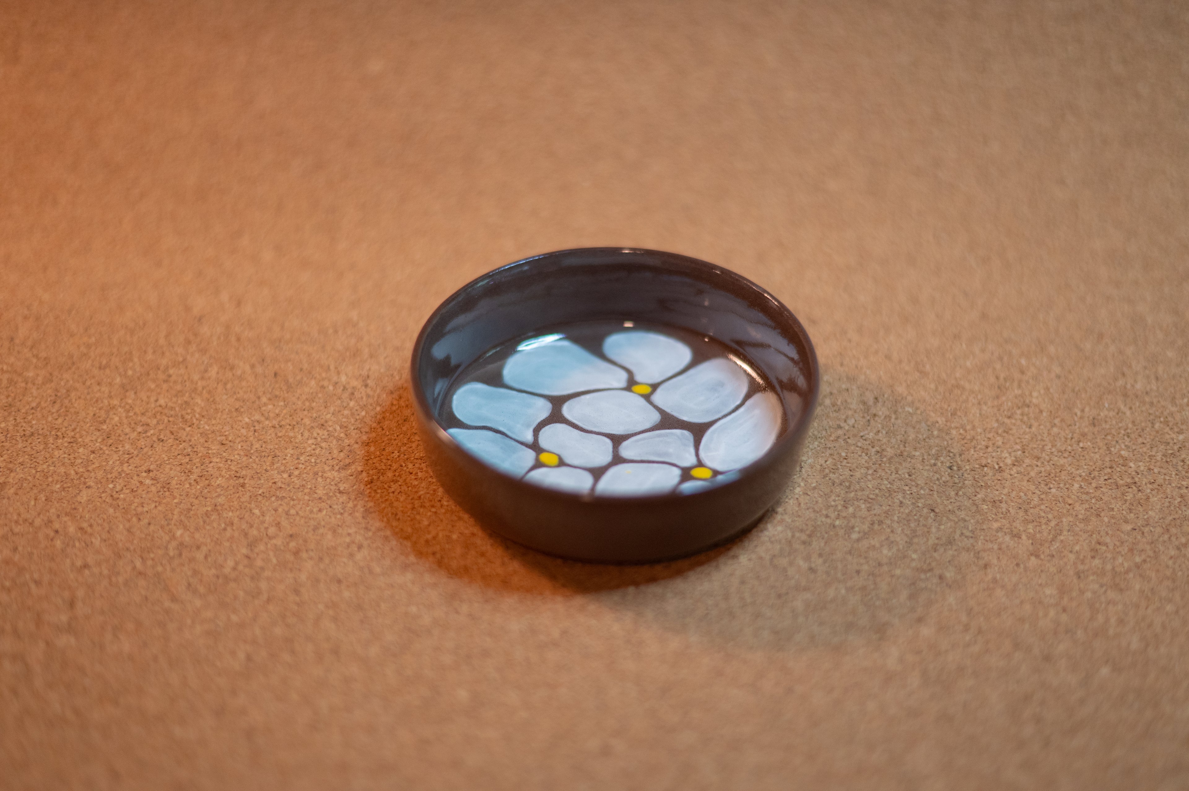 small brown floral side plate