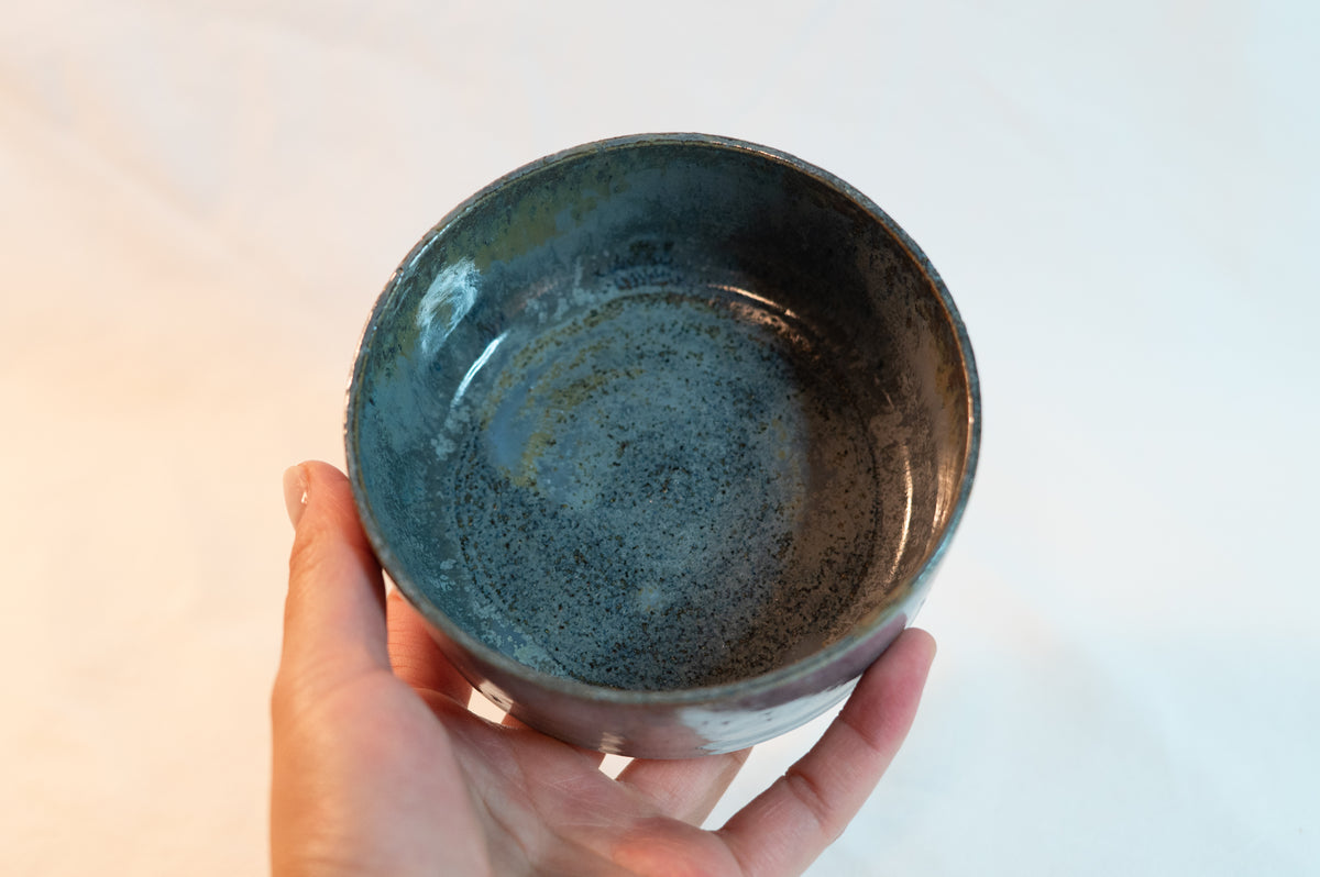 small dark blue bowl