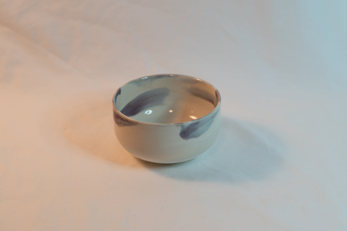 white purple porcelain bowl
