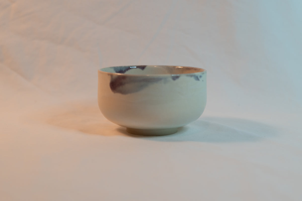 white purple porcelain bowl