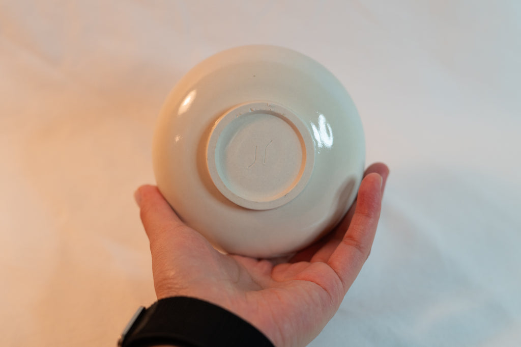 white purple porcelain bowl