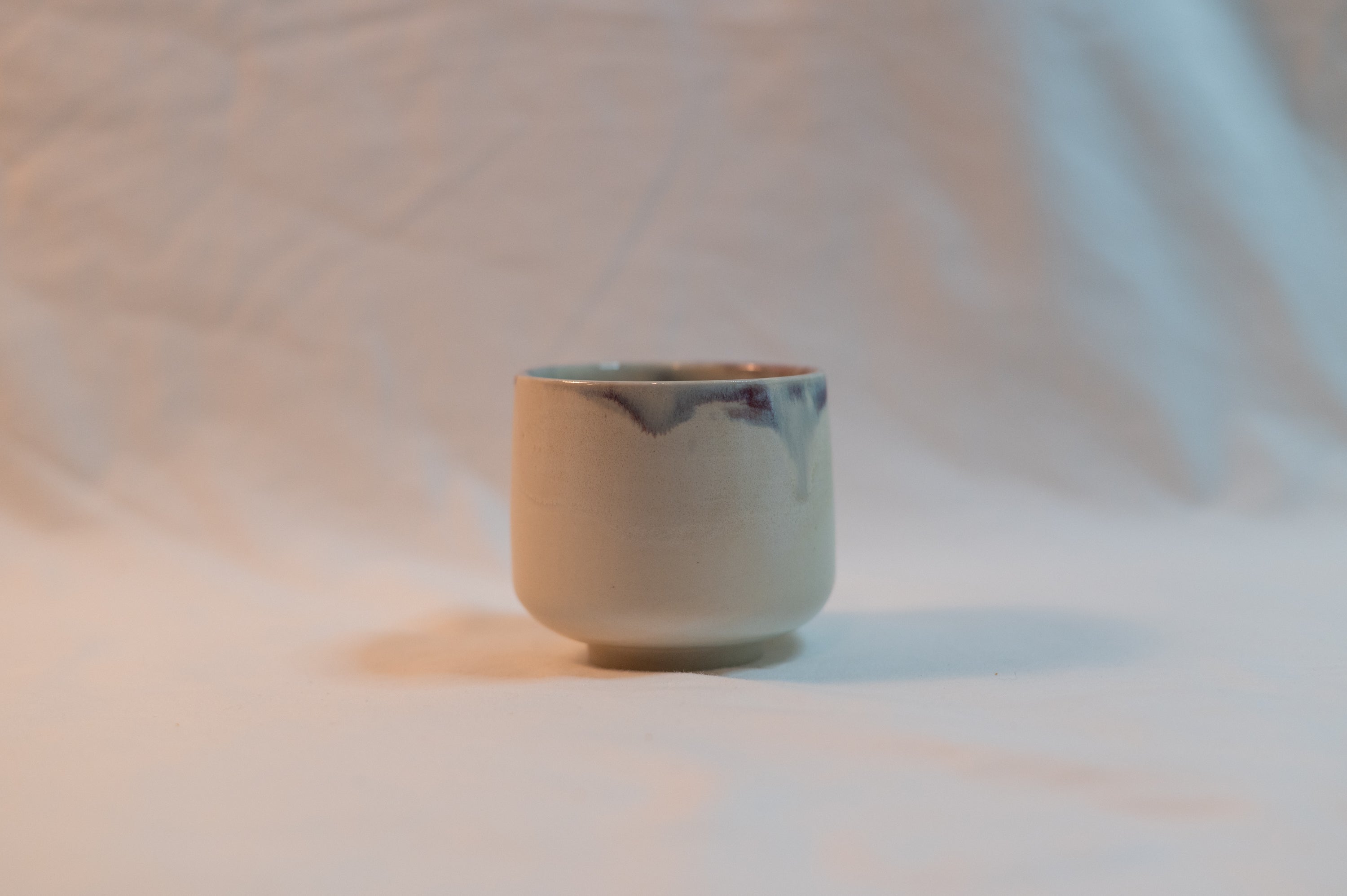 blue rim tea cup
